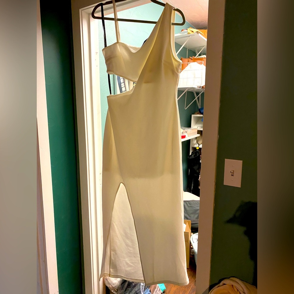Rachel Roy white one shoulder hip cut out dress.